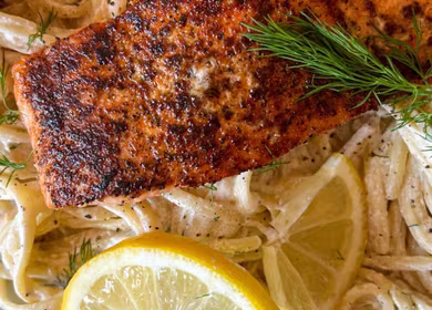 Pasta in Creamy Lemon Dill topped with Norwegian Salmon by Heifa Odeh