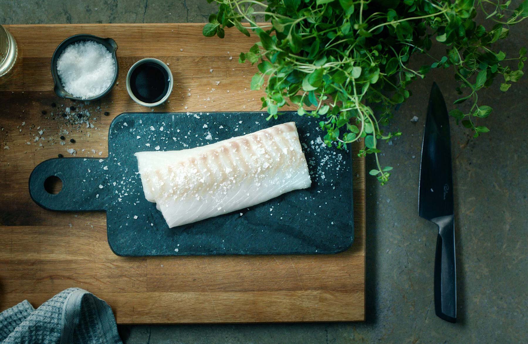 Cod on a chopping board